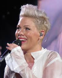 Discover the electrifying journey of pop sensation Pink with a captivating biography, including her humble beginnings and rise to fame. Stay updated on her upcoming tour dates across the United States and secure your tickets to witness her powerhouse vocals live in concert!